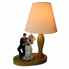 Wooden table lamp with shade and wedding statue 